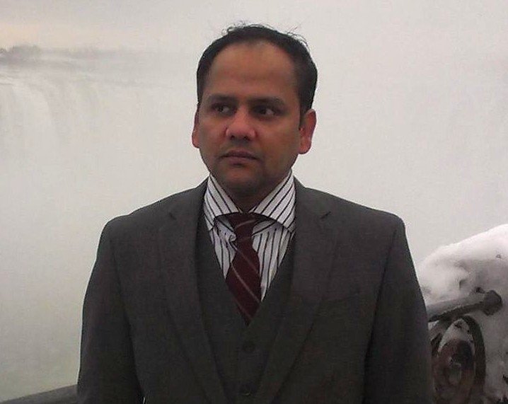 Engineers shaking hands at a construction site